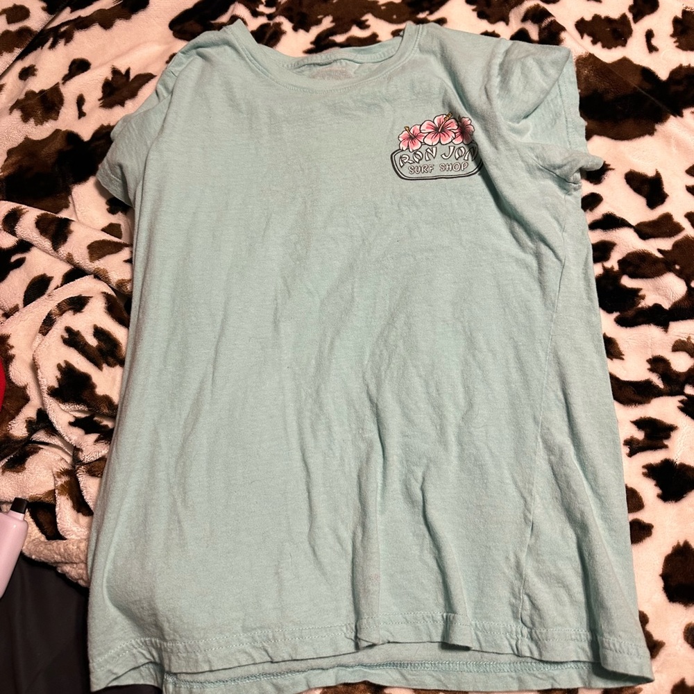 Ron John blue tee